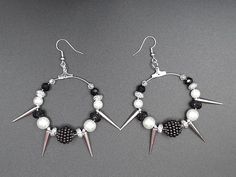 Silver Emo Earrings For Parties, Edgy Handmade Jewelry For Parties, Emo Style Metal Earrings For Party, Emo Metal Earrings For Parties, Handmade Edgy Jewelry For Party, Edgy Hoop Earrings As A Gift, Edgy Earrings For Concert, Black Gothic Jewelry With Spikes, Silver Punk Hoop Earrings For Party