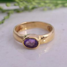 "Amethyst Ring, Ring for Women, Kyklos Jewelry, February Birthstone ring, Stacking ring, Minimalist ring, Dainty brass ring, Boho ring METAL:- Brass STONE:-Amethyst Benefits of Amethyst... ♥Amethyst Provides Serenity. ♥Amethyst Promotes Hormone Balance. ♥Amethyst Can Help With Weight Loss. ♥Amethyst Detoxifies the Body. ♥Amethyst Reduces Headaches. ♥Amethyst Helps With Other Physical Issues. ♥Amethyst Provides Stress Relief. ♥ BRASS SPECIALTY ♥ Brass is known for its strength and durability. How Heirloom Amethyst Ring With Bezel Setting, Handmade Amethyst Ring In Yellow Gold, Vintage Amethyst Crystal Ring With Gemstone Detail, Vintage Amethyst Crystal Ring With Gemstone, Vintage Purple Amethyst Ring With Bezel Setting, Heirloom Style Amethyst Ring As A Gift, Heirloom Amethyst Ring Suitable For Gifting, Heirloom Style Amethyst Ring For Gift, Heirloom Style Amethyst Ring Gift