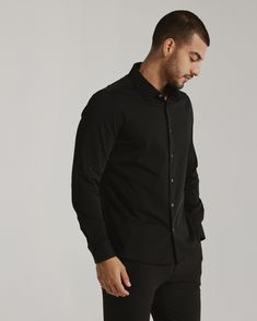 We created the perfect long sleeve button up, with the right mixture of comfort and style, just for you. Our performance shirts have 4-way stretch, are moisture wicking, wrinkle resistant and above all a great new addition to your wardrobe. The performance shirt will be your go-to for any occasion - day to night. This is a shirt that will have you satisfied at any given time. Details Model is 6'1" and wears a size medium. Care: Machine wash cold on delicate cycle with similar colors. Do not use Versatile Black Button-up Shirt, Modern Black Long Sleeve Dress Shirt, Versatile Fitted Long Sleeve Shirt, Versatile Long Sleeve Fitted Shirt, To Night, Short Sleeve Button Up, Lifestyle Brands, Long Sleeve Shirt, New Product