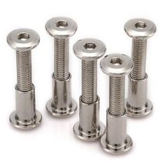 six stainless steel screws and nuts on a white background