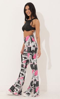 Festival Wear > Oaklynn Pant in White Newsprint Pink Graphic Print Bottoms For Spring, Spring Stretch Pants With Graphic Print, Spring Pink Graphic Print Bottoms, Chic Fitted Graphic Print Bottoms, High Waist Stretch Bottoms With Graphic Print, Fitted Graphic Print Chic Bottoms, Trendy Fitted Bottoms With All Over Print, Stretch Wide Leg Pants With Graphic Print, Fitted Pants With Graphic Print For Spring