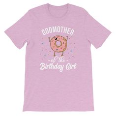 Just for the Godmother of the Birthday Girl! Features a fun Kawaii style donut with pink frosting and rainbow sprinkles. A great tee to wear to your Goddaughter's birthday! Great birthday gift as well. This t-shirt is everything you've dreamed of and more. It feels soft and lightweight, with the right amount of stretch. It's comfortable and flattering for both men and women. * 100% combed and ring-spun cotton (heather colors contain polyester) * Fabric weight: 4.2 oz (142 g/m2) * Shoulder-to-sho Fun Pink T-shirt For Birthday, Godmother And Goddaughter Shirts, Eleventh Birthday, The Godmother, Birthday White T-shirt With Unicorn Print, Donut Shirt, Birthday Unicorn Print Crew Neck T-shirt, God Mother, Affordable Unicorn Print T-shirt For Birthday