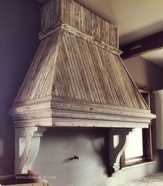 an old fashioned stove in the corner of a room