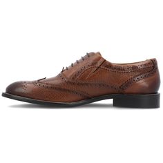 A classic that is always in fashion the Garland by Thomas & Vine. This genuine leather wingtip dress shoe features a 6 mm Tru Comfort Foam� footbed and a cushioned collar for all-day comfort. Classic brogue details and pebbled details top the look. Classic Wingtip Leather Shoes With Perforated Toe Box, Semi-formal Cognac Oxfords With Brogue Detailing, Cognac Wingtip Oxfords For Business Casual, Cognac Oxfords With Brogue Detailing And Almond Toe, Cognac Goodyear Welted Wingtip Leather Shoes, Cognac Wingtip Oxfords With Leather Sole, Cognac Wingtip Dress Shoes For Derby, Cognac Dress Shoes With Brogue Detailing And Almond Toe, Cognac Wingtip Shoes For Business Casual