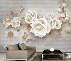 a living room with white roses on the wall and butterflies in the air above it