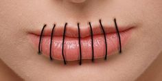 a woman's lips with black lines on them