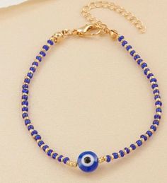 Blue evil eye decor bracelet. Perfect for gifts for her. Evil Eye Beaded Bracelet, Evil Eye Decor, Eye Decor, Blue Evil Eye, Evil Eye, Beaded Bracelet, Favorite Jewelry, Beauty Book, Jewelry Bracelets