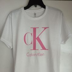 Brand New Sealed Women's Calvin Klein White Tee Size Small They Will Be Sealed Spring Casual T-shirt With Monogram Print, Summer Monogram Print Tops, Trendy Cotton Tops With Monogram Print, Casual Monogram Print T-shirt For Spring, Casual Monogram Print Tops For Spring, Casual Tops With Monogram Print For Spring, Casual Spring Tops With Monogram Print, Spring Cotton Monogram Print Tops, Spring Cotton Tops With Monogram Print