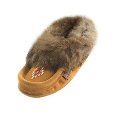 Description Details Sizing These traditional Native style moccasins slippers are comfy and cute on any child's feet. They have a warm fleece lining throughout the entire slipper making them cozy and warm for cold weather. They are Canadian handmade from genuine suede leather in an Indian Tan color and have a double soft suede sole perfect for indoor use.These junior leather moccasin slippers have a real fuzzy rabbit fur collar adding a unique look and they have a beautiful Native American style Winter Brown Moccasins With Rubber Sole, Comfortable Brown Winter Moccasins, Brown Slip-on Moccasins For Winter, Winter Brown Slippers With Soft Sole, Comfortable Slip-on Winter Moccasins, Comfortable Winter Slip-on Moccasins, Aasimar Fighter, Beaded Rabbit, Beaded Moccasins