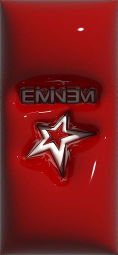 an emblem on the side of a red car that says,'emmen '