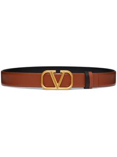 chocolate brown/black calf leather reversible VLogo Signature gold-tone hardware adjustable fit logo-buckle fastening punched holes This piece comes complete with a protective dust bag. This piece comes with a certificate of authenticity. Saddle Brown, Belt Style, Reversible Belt, Boutique Online, Watch Design, Valentino Garavani, Smooth Leather, Leather Belt, Online Boutique