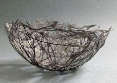 a bowl that has some branches in it