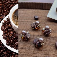 coffee beans and chocolate covered donuts on a wooden table next to a cup of coffee