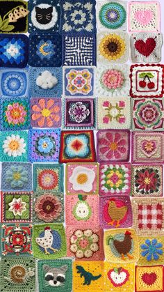 crocheted squares with flowers and hearts are arranged on a table top, all in different colors