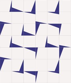 an abstract blue and white tile pattern with several triangles in the center, on top of each other