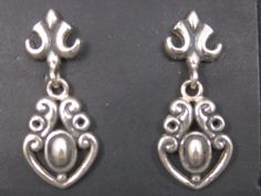 These beautiful 90s earrings are sterling silver. Measurements: 7/16 by 1 1/8 inches Weight: 3.7 grams Condition: Old new stock Victorian Style Earrings, 90s Earrings, Style Earrings, Victorian Style, Victorian Fashion, Old And New, Earrings Handmade, Etsy Earrings, Dangle Drop Earrings