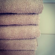 four towels stacked on top of each other