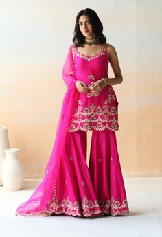 Editor's Note Featuring An Fuchsia Pink Tunic & Sharara Set In Dupion Silk Base With Floral Thread Embroidery Highlighted With Sequins, Cut Dana And Various Other Embellishments. It Is ... Hot Pink Sharara, Pink Sharara Suit, Pink Sharara, Sharara Designs, Haldi Outfits, Sangeet Outfit, Mehendi Outfits, Indian Dresses Traditional, Pink Lehenga