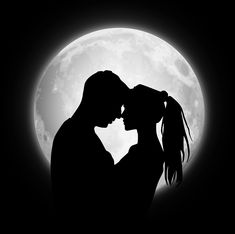 the silhouette of a couple kissing in front of a full moon with their face to each other