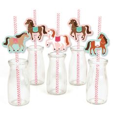 some glass vases with horses on them and paper straws in front of them