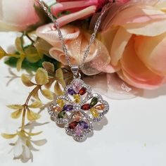 Brand New 925 Silver Plated Swarovski Multi Colored Crystal Flower Necklace. Comes With A Nice Box Not From Swarovski... Look At Last Pics For Details On What Swarovski Crystals Are Chain Is 16in Long With 2 Extra In Elegant Multicolor Flower Shaped Necklace, Silver Jewelry With 17 Jewels In Flower Shape, Elegant Multicolor Jewelry With Flower Pendant, Formal Multicolor Sterling Silver Necklace, Elegant Multicolor Flower Pendant Jewelry, Sterling Silver Multicolor Jewelry With Sparkling Stones, Multicolor Sparkling Stones Sterling Silver Jewelry, Multicolor Sterling Silver Jewelry With Sparkling Stones, Silver Multi-stone Crystal Jewelry