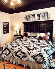 a black and white bed in a bedroom