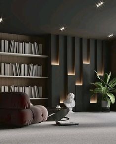 a living room filled with furniture and bookshelves next to a potted plant