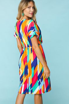 Haptics Geometric Surplice V Neck Short Sleeve Dress This adorable and fun pocketed dress is perfect for any spring summer event with vibrant geometric style pattern. Sports Team Apparel, Summer Clearance, Long Sleeve Outerwear, Summer Events, Team Apparel, Short Sleeve Dress, Pocket Dress, Country Girls, Sleeve Dress