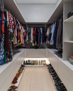 an organized closet with shoes and scarves