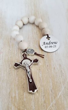 This listing is for 1 customized rosary. You may add your own quote, message or name and date. You can also customize the gemstones used and cross colour. Please send me a message to gemstone and cross options. A mock up will be sent before charm is engraved. Shipping upgrade available here https://www.etsy.com/ca/listing/852496799/3-business-days-to-us Personalized Spiritual Rosary Gift, Spiritual Rosary Bracelet With Cross For First Communion, Personalized Spiritual Rosary Bracelet, Personalized Spiritual Rosary Bracelet With Round Beads, Personalized Rosary For First Communion, Personalized Rosary With Round Beads As Gift, Spiritual Cross Rosary For Confirmation, Personalized Spiritual Rosary As Gift, Diy Souvenirs