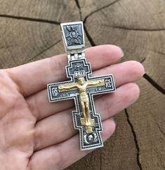 Silver Orthodox cross with gilded crucifix Article 0152 ✔️Weight 37 grams (+-) ✔️Size 68/36/4.5 mm (including lug), ✔️Internal lug size 14.5/9 mm ✔️Silver 925 + 24K gold plated 999 + blackening ✔️Possible production in: 🟡Gold 14K or 18K (red, yellow, white) 🌕24K gold plated sterling silver 🔘Silver with blackening or rhodium  Need more information? If you have any questions please don't hesitate to contact us! Luxury Silver Cross Necklace As Gift, Luxury Cross Necklace As Gift, Luxury Cross Necklace For Anniversary, Luxury Silver Cross Necklace For Gift, Luxury Silver Cross Necklace, Hallmarked Crucifix For Anniversary, Luxury Symbolic Crucifix Jewelry, Byzantine Cross Pendant Jewelry Gift, Ethiopian Orthodox Cross