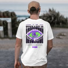 Stand out in the crowd with this retro vintage trippy neon green and purple eye graphic skateboard fashion t-shirt. Perfect for skaters and streetwear enthusiasts, this unique urban style tee is designed to turn heads and make a statement. Crafted for comfort and durability, it's an ideal addition to your trendy grunge wardrobe. 🛹 Unique Design: Features an eye-catching neon green and purple eye graphic, perfect for those who love bold and artistic designs. 👕 Comfortable Fit: Made from high-qu Purple Band Merch T-shirt For Streetwear, Urban Purple T-shirt With Graphic Print, Rave Graphic T-shirt For Streetwear, Retro T-shirt For Music Festivals And Streetwear, Rave Style Graphic T-shirt For Streetwear, Purple Graphic T-shirt For Streetwear, Purple Graphic Design T-shirt For Streetwear, Summer Rave T-shirt With Graphic Design, Summer Rave T-shirt With Graphic Print