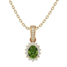 This gemstone and diamond necklace features one 7x5mm peridot gemstone weighing approximately 1 carat. There are 19 diamonds in H-I color, SI2-I1 clarity totaling approximately 1/3 carat. Total carat weight is approximately 1 1/3 carat. This necklace is in 14 karat white gold and comes with an 18 inch cable chain with a spring ring clasp. This pendant measures about 3/4 inch long. | Belk & Co 1 1/3 Carat Oval Shape Peridot and Diamond Necklace In 14 Karat Gold, 18 Inches, Yellow Ruby And Diamond Necklace, Pink Topaz, Peridot Gemstone, Green Amethyst, 3 Carat, Diamond Pendant Necklace, Fine Jewellery Necklace, 1 Carat, Cable Chain