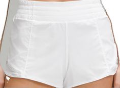 White Short Bottoms By Lululemon, Lululemon Yoga Bottoms, Lululemon Sports Bottoms With Built-in Shorts, Lululemon Summer Yoga Bottoms, Lululemon Yoga Bottoms For Summer, White Athletic Shorts For Workout With Short Inseam, Lululemon Athletic Shorts With Built-in Shorts For Summer, White Lululemon Athletic Shorts, Lululemon Athletic Shorts For Summer Training