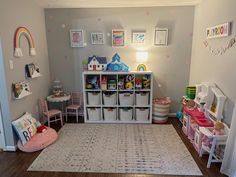 a child's play room with toys and decor