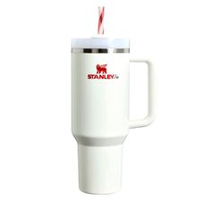 a white travel mug with a straw in the cup and stanley's logo on it