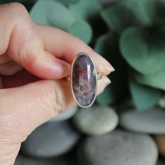 Handmade Sterling Silver Plume Agate Statement RingPlume agates are thought to eliminate and transform negativity...Who knew? It is also just a really pretty earthy gemstone...Here are the details:This lovely oval agate has a plume of red and is made with a fine & sterling silver on a sturdy silver band - handcrafted by Will Macy. Size 7 1/2 Oval Agate Rings For Healing, Handmade Sterling Silver, Silver Band, Handcrafted Jewelry, Jewelry Pieces, Statement Rings, Agate, Band, Sterling Silver