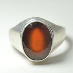 "Natural Certified Hessonite Garnet/Gomed 4.00 to 11.00 carat 92.5 Sterling Silver Astrology Ring For Men & Women.The product in display is a Gemstone and it is finished in an attractive Brown color. Wearing hessonite garnet helps in getting occupational success and fame, social reputation, wealth, marital bliss, and prosperity in life. Its mystic powers protect the wearer against evil spirits, rivals, enemies, dangerous plots, controversies, and the possibility of being poisoned. This fashi Amber Birthstone Ring, Classic Round Jewelry, Sterling Silver Gemstones For Formal Occasions, Classic Moonstone Ring With Round Stone, Classic Faceted Gemstones For Anniversary, Classic Faceted Round Cut Ring, Modern Polished Finish Gemstones, Classic Sterling Silver Gemstone Ring, Classic Faceted Gemstones As Gifts