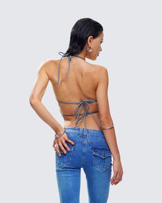 They’ll all be chasing after you in this blue denim butterfly top 🦋 Made from denim fabric and complete with studded detailing, a raw frayed edge, and adjustable ties for a look that will have everyone's hearts fluttering 💙 Blue Backless Crop Top For Spring, Trendy Denim Top For Summer Festival, Trendy Summer Festival Denim Top, Blue Denim Top For Festivals, Blue Denim Festival Top, Blue Denim Tops For Festival, Summer Festival Denim Top, Blue Spring Festival Halter Top, Blue Halter Top For Spring Festival