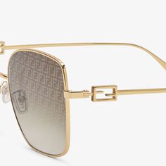 Baguette Luxury Gold Sunglasses With Metal Frame, Gold Rectangular Sunglasses With Gradient Lenses, Designer Gold Sunglasses With Gradient Lenses, Designer Gold Rectangular Sunglasses, Luxury Gold Square Frame Sunglasses, Elegant Gold Square Frame Sunglasses, Designer Gold Square Frame Sunglasses, Luxury Rectangular Sunglasses With Metal Frame, Luxury Square Sunglasses With Gradient Lenses