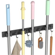 there are several different colored umbrellas hanging from the hooks on this rack, along with other items