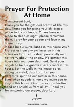 a prayer for protection at home with flowers on the table and in front of it