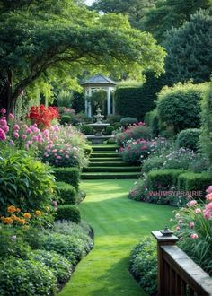 a garden with lots of flowers and trees