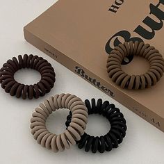 Grab these spiral coil hair ties, a stretchy 1.75-inch width dream for all hair types! Coil Hair Ties, Hair Coils, Binders, All Hair Types, Hair Types, Hair Ties, Jade, Hair, Black