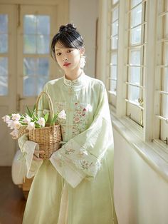 Ethereal embroideries of flowers and butterflies appearing around a traditional vase, this set is full of traditional charm with modern twists! The Paradise 天堂 Modernized Ming Dynasty Aoqun Set is an adorable modernized set featuring classic Ming pieces reimagined for the modern goddess. The Yuanling Changshan 圆领长衫 (round collar long shirt) contains most of the embroidery within the Buzi 补子 (mandarin square) with additional flowers and butterflies along the cuffs. Subtle scalloping along the cuf Traditional Vase, Modern Goddess, Luo Binghe, Traditional Vases, Color Palette Yellow, Valentine Desserts, Fashion Terms, Modest Fits