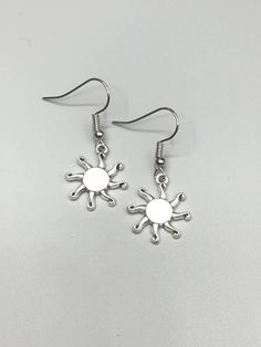 Simple stylish Tibetan silver sun earrings Adjustable Drop Earrings With Sun Design, Trendy Sterling Silver Earrings For Summer, Sun And Moon Design Metal Earrings, Metal Sun Design Earrings For Gift, Summer Jewelry With Sun And Moon Design, Sun Design Drop Earrings, Summer Metal Earrings With Sun Design, Metal Sun Design Earrings For Summer, Silver Sun Design Earrings