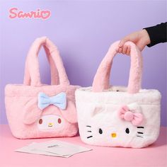 Kawaii Plush Tote Bag Carry your essentials in style with our adorable Kawaii Plush Tote Bag. Its soft plush material will keep your belongings safe and secure, while the cute design adds a touch of charm to any outfit. Perfect for any occasion, our tote bag is both functional and cute. My Melody Tote Bag, Kawaii Hello Kitty Outfit, Sanrio Characters Kuromi, Sanrio Tote, Sanrio Bag, Sanrio Plush, Eco Materials, Melody Hello Kitty, Hello Kitty Bag