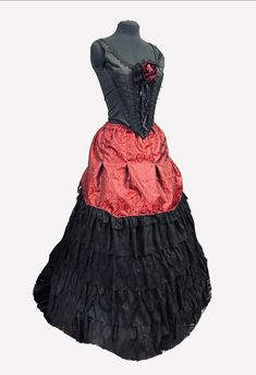 This Gothic Steampunk Victorian outfit in black and dark red is perfect for formal occasions. The Raven SDL designer brand brings a unique and edgy style to the outfit. The black colour gives a classic touch while the deep red adds a pop of colour to the ensemble.  The outfit is perfect for weddings, proms, and other formal events. It is new with tags and in pristine condition. The quality of the outfit is exceptional and will make you stand out in any crowd. Get ready to make a statement with t Black Steampunk Skirt For Costume, Steampunk Costume Skirt In Black, Steampunk Style Black Costume Skirt, Black Steampunk Corset For Costume Party, Black Steampunk Corset Dress For Halloween, Black Steampunk Corset Dress For Costume Party, Black Fitted Vampire Corset Dress, Black Punk Corset Dress For Costume, Black Fitted Gothic Corset Dress