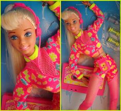 the barbie doll is wearing a pink outfit