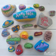 painted rocks with words and pictures on them